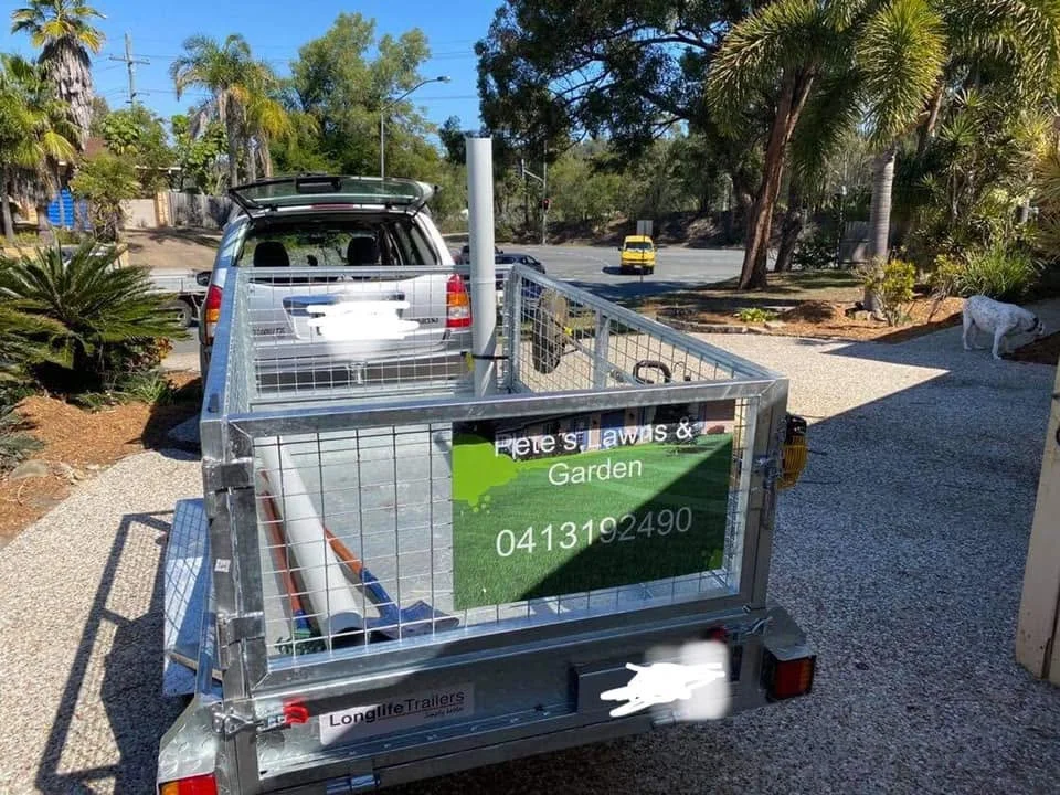 Pete's M Lawn and Garden branded trailer on site, Molendinar