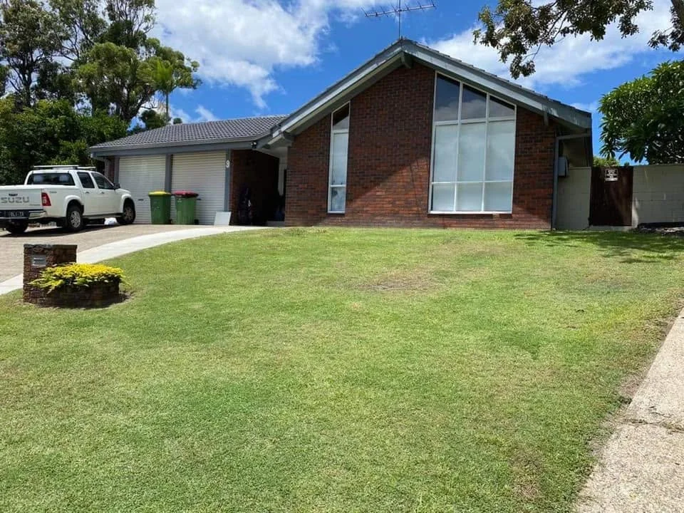 Neat suburban front lawn and house exterior, Molendinar